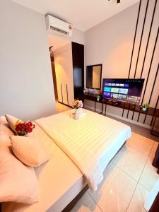 Postel nebo postele na pokoji v ubytování Axon Residence Bukit Bintang By Lux Stay KLCC Pavillion