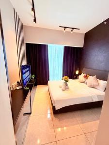 Postel nebo postele na pokoji v ubytování Axon Residence Bukit Bintang By Lux Stay KLCC Pavillion