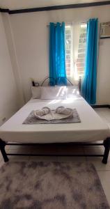 Una cama o camas en una habitación de LCTHREE Transient