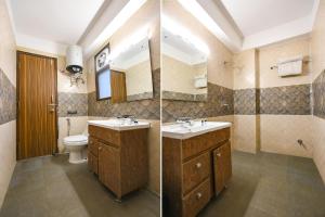 Koupelna v ubytování FabHotel DM 45 - Nr Millenium city center Metro