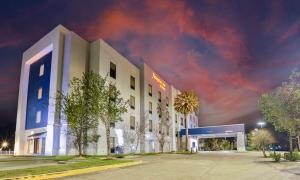 a rendering of a hotel at night at Hampton Inn Baton Rouge - Denham Springs in Denham Springs