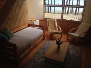 Posteľ alebo postele v izbe v ubytovaní Magma Lodge, Pucon