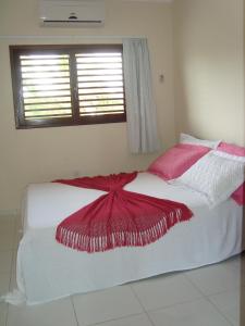 Cama o camas de una habitación en Muriú Beach Flat