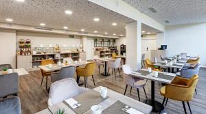 Reštaurácia alebo iné gastronomické zariadenie v ubytovaní Sercotel Córdoba Delicias