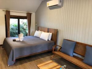 Postel nebo postele na pokoji v ubytování Likita Resort + 37 fotografií