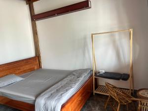 Postel nebo postele na pokoji v ubytování Homestay Bảo Lộc Ngọc Kim