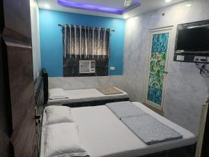 Postel nebo postele na pokoji v ubytování Hotel Globe International