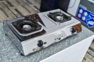 a stove top oven sitting on top of a counter at Villa serene galle in Galle
