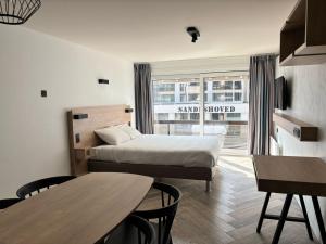 Letto o letti in una camera di Hotel Sandeshoved Zeedijk
