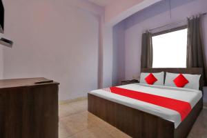 Postel nebo postele na pokoji v ubytování Hotel O Doraemon Residency