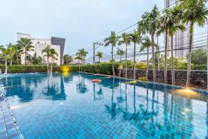 Bazén v ubytování Dusit Grand Condo View nebo v jeho okolí + 13 fotografií