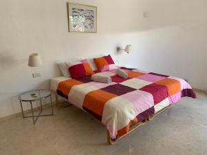 Posteľ alebo postele v izbe v ubytovaní Zen Villa Anfi Tauro Golf with private heated pool
