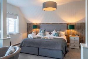 Un ou plusieurs lits dans un hébergement de l'établissement Botany Bay Hotel