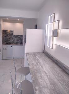 Kuchyňa alebo kuchynka v ubytovaní Résidence Graziella Appartement 521 + 7 fotografií