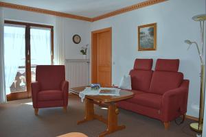 Posezení v ubytování Ferienwohnung-Susanne-im-Gaestehaus-Bergfrieden