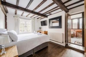 Voodi või voodid majutusasutuse Bramble Cottage toas +15 fotot