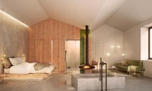 a bedroom with a bed and a fireplace at Herdade do Ananás in Ponta Delgada