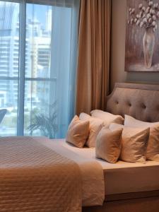Studio One Dubai Marina - TIE Vacation Homes客房内的一张或多张床位