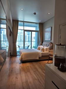 Studio One Dubai Marina - TIE Vacation Homes客房内的一张或多张床位