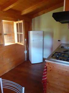 Kuchyň nebo kuchyňský kout v ubytování EDERA Parco Vacanze