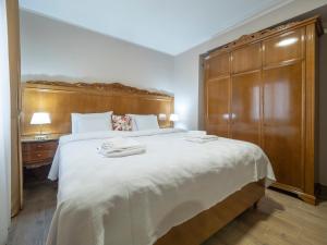 Postel nebo postele na pokoji v ubytování Hotel Perun