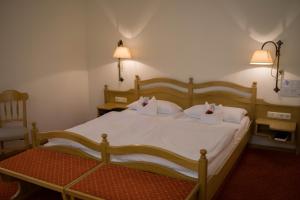 Postel nebo postele na pokoji v ubytování Hotel Leicht