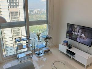 Μια τηλεόραση ή/και κέντρο ψυχαγωγίας στο Grape Residence Hotel