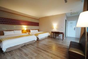 Postel nebo postele na pokoji v ubytování York Hotel