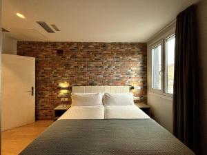 Posteľ alebo postele v izbe v ubytovaní Colectia Hotel Urumea