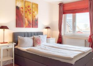 Postel nebo postele na pokoji v ubytování Ferienwohnung Soleil