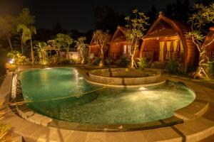 Bazén v ubytování Lumbung River Ubud Villas nebo v jeho okolí