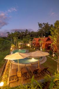 Bazén v ubytování Lumbung River Ubud Villas nebo v jeho okolí