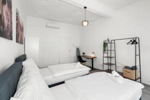 Postel nebo postele na pokoji v ubytování Nexstay Erlangen Zentrum Komfort für Familien & Gruppen für 6 Gäste