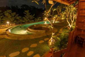 Bazén v ubytování Lumbung River Ubud Villas nebo v jeho okolí