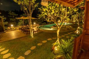 Bazén v ubytování Lumbung River Ubud Villas nebo v jeho okolí