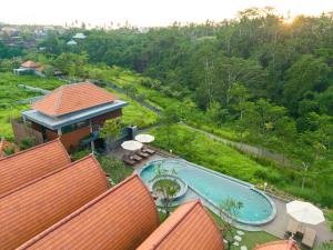 Bazén v ubytování Lumbung River Ubud Villas nebo v jeho okolí