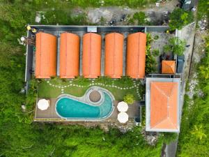 Bazén v ubytování Lumbung River Ubud Villas nebo v jeho okolí