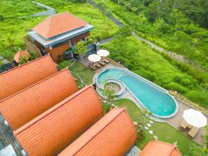 Bazén v ubytování Lumbung River Ubud Villas nebo v jeho okolí