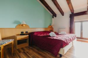Postel nebo postele na pokoji v ubytování Hotel Spera