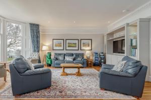 Posezení v ubytování Gillespie Apartments - Golfer's Dream