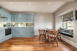 Kuchyň nebo kuchyňský kout v ubytování Gillespie Apartments - Golfer's Dream