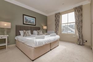 Postel nebo postele na pokoji v ubytování Gillespie Apartments - Golfer's Dream