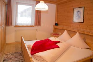 Postel nebo postele na pokoji v ubytování Ferienhaus Aurora