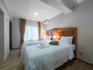 Postel nebo postele na pokoji v ubytování Hotel Perun