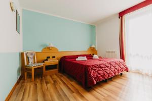 Postel nebo postele na pokoji v ubytování Hotel Spera