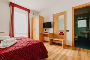 Postel nebo postele na pokoji v ubytování Hotel Spera