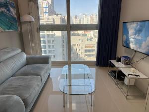 Μια τηλεόραση ή/και κέντρο ψυχαγωγίας στο Grape Residence Hotel