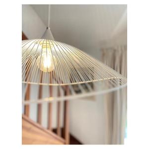 a light hanging from a ceiling in a room at Entre Mer et Dunes de Pin in Neufchâtel-Hardelot +37 photos