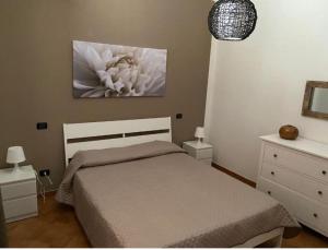 Postel nebo postele na pokoji v ubytování Villa Piruzzu CV Torre Mulinazzo app P