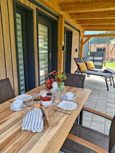 Rõdu või terrass majutusasutuses Chalet Stuhleckblick-Ferienhaus direkt an der Piste und mit eigener Sauna